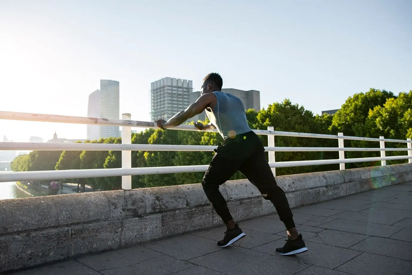 Full shot of a man training outdoors.